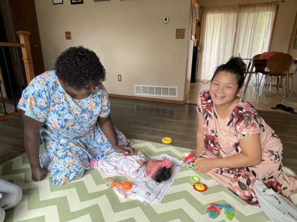 woman and baby with doula